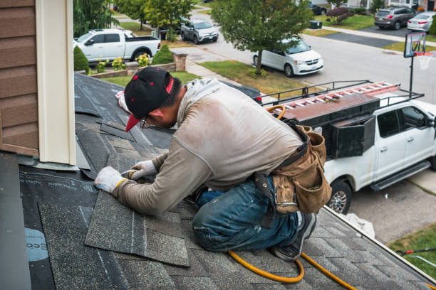 Professional Roofing technician working in Norwell, MA